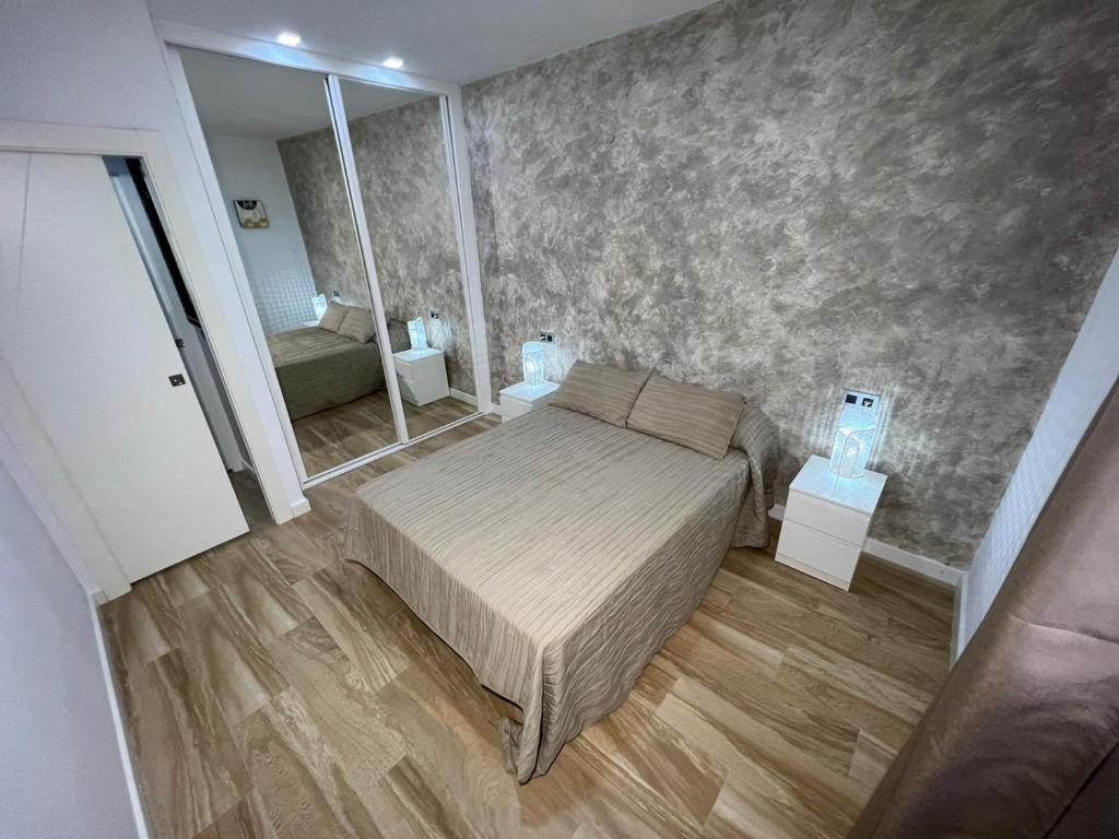 Posteľ alebo postele v izbe v ubytovaní Camaretas sweet dreams acogedor piso junto al mar