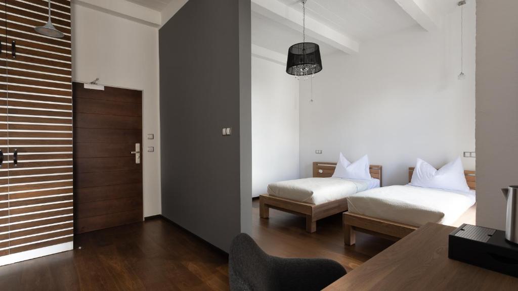 Posteľ alebo postele v izbe v ubytovaní Arena Hotel Samorin