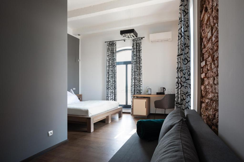 Posteľ alebo postele v izbe v ubytovaní Arena Hotel Samorin