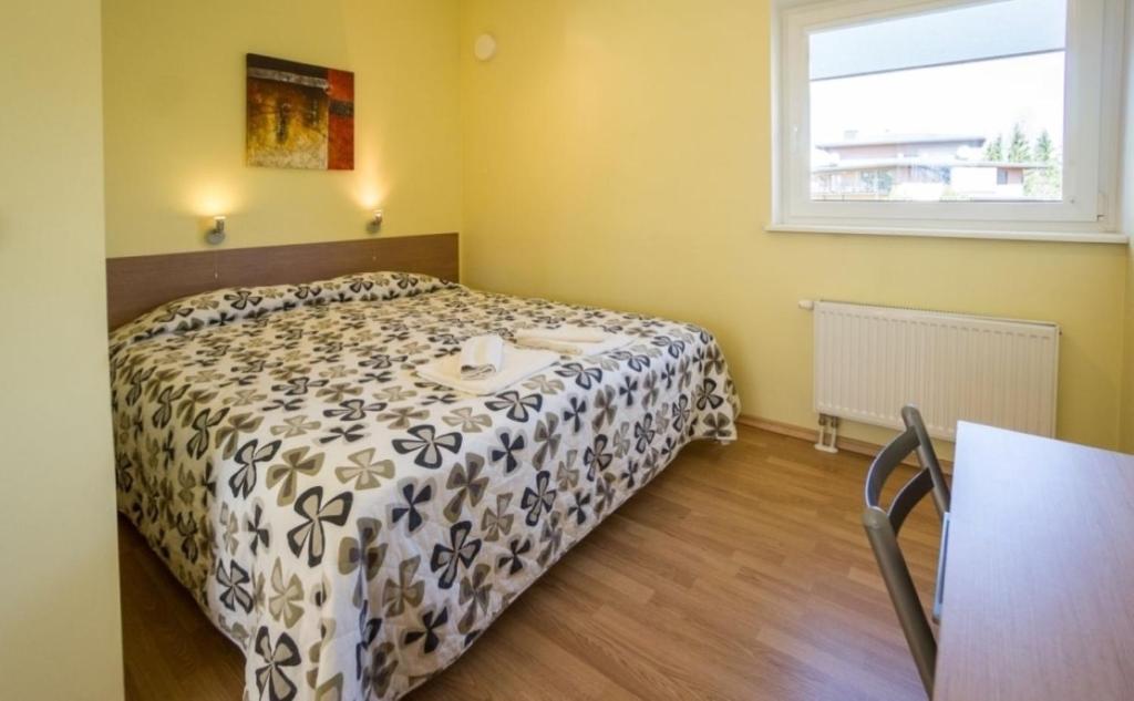Postel nebo postele na pokoji v ubytování Nuustaku Villa