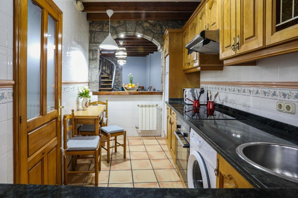 Kuchyň nebo kuchyňský kout v ubytování La Casina del Collau