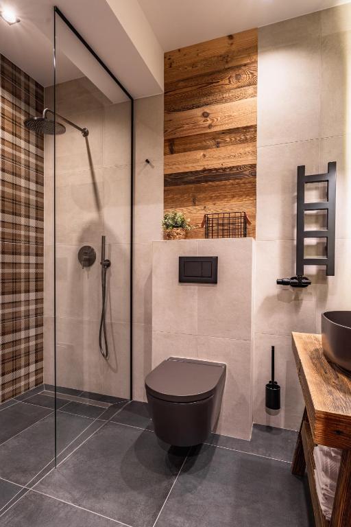 Kúpeľňa v ubytovaní Apartamenty i Pokoje Krupówki 49