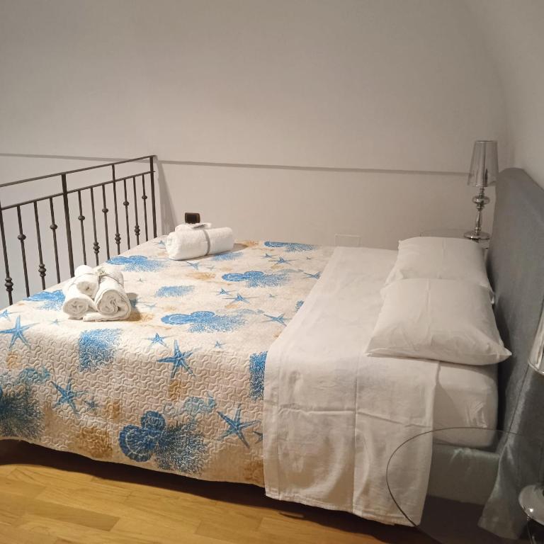 Łóżko lub łóżka w pokoju w obiekcie B&B Verdi