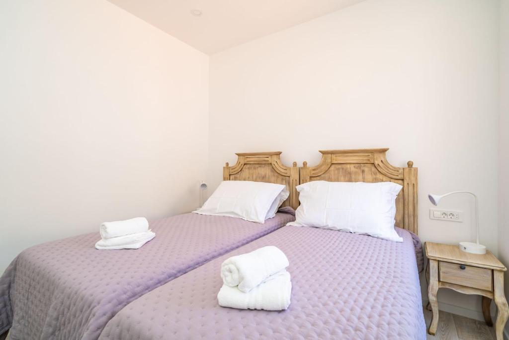 Posteľ alebo postele v izbe v ubytovaní Luxury apartment Petra with terrace and city view