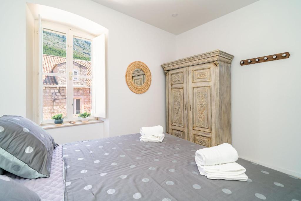 Posteľ alebo postele v izbe v ubytovaní Luxury apartment Petra with terrace and city view