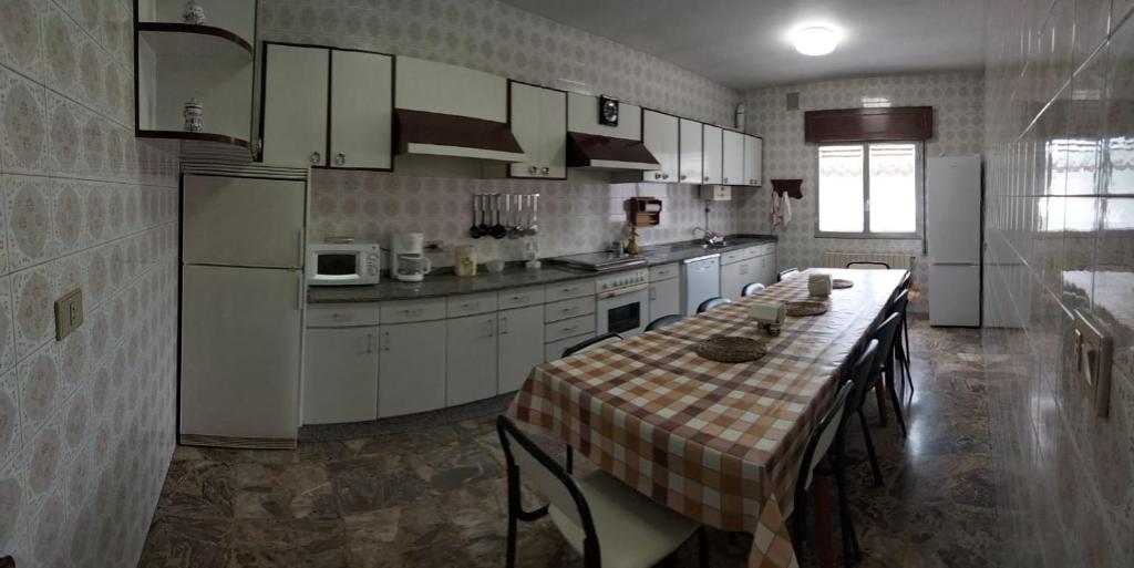 Kuchyň nebo kuchyňský kout v ubytování Vivienda familiar en la Ría de Vigo