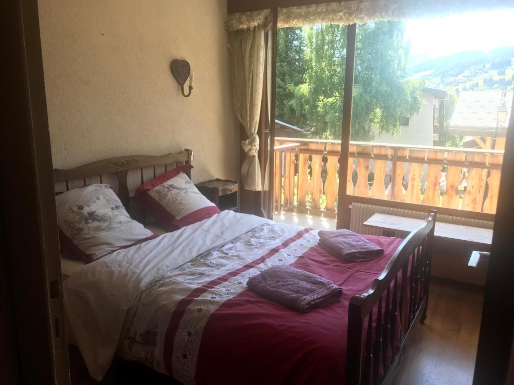 Posteľ alebo postele v izbe v ubytovaní Appartement 2 pieces LE SAPPORO
