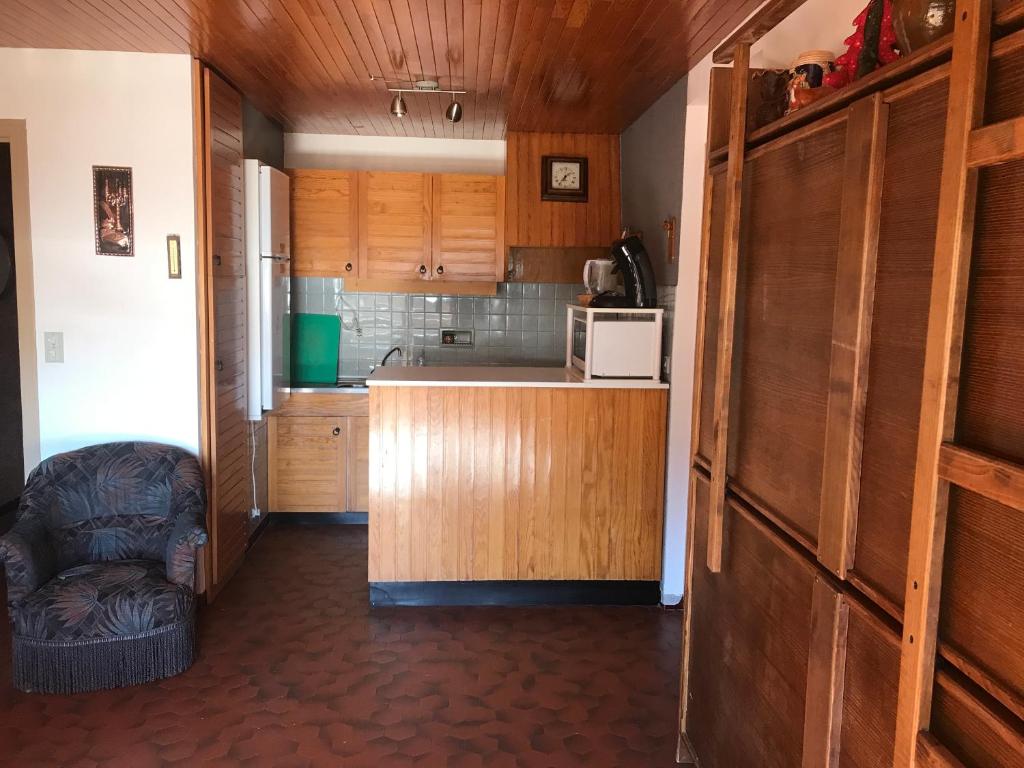 Kuchyňa alebo kuchynka v ubytovaní Appartement 2 pieces LE SAPPORO