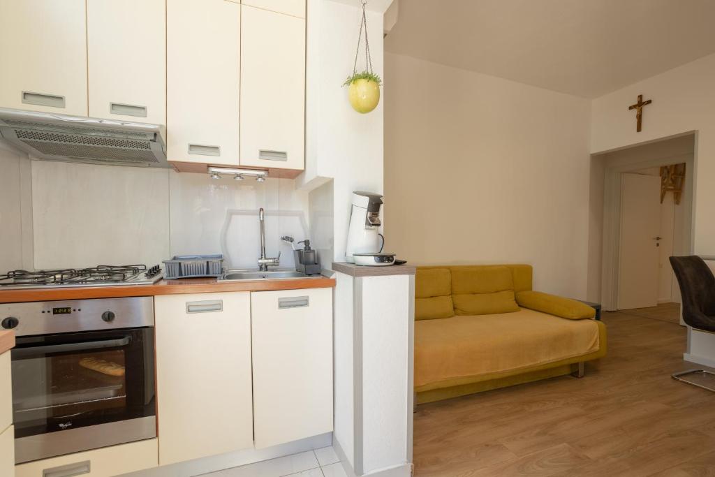 Kuchyňa alebo kuchynka v ubytovaní Apartman Citromelo