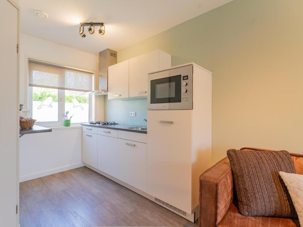 Kuchyň nebo kuchyňský kout v ubytování Tiny house Koolmees