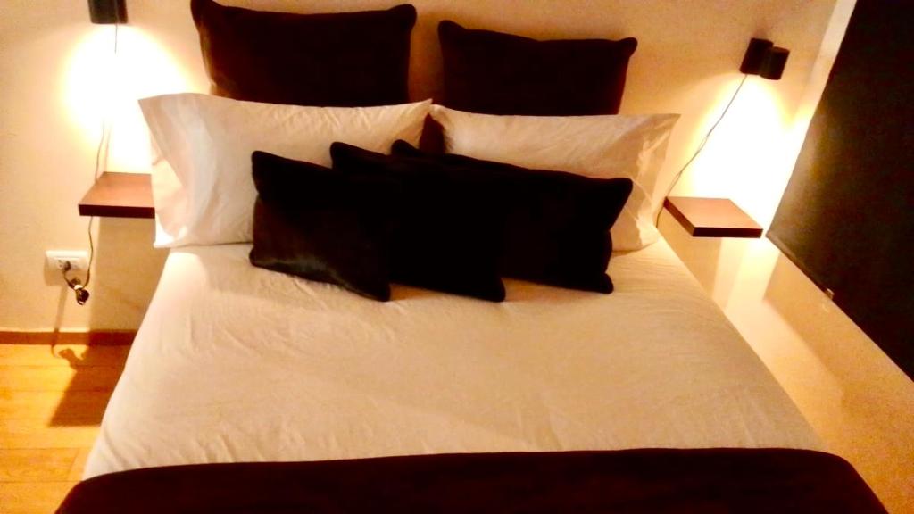 Ένα ή περισσότερα κρεβάτια σε δωμάτιο στο Hjem Recoleta