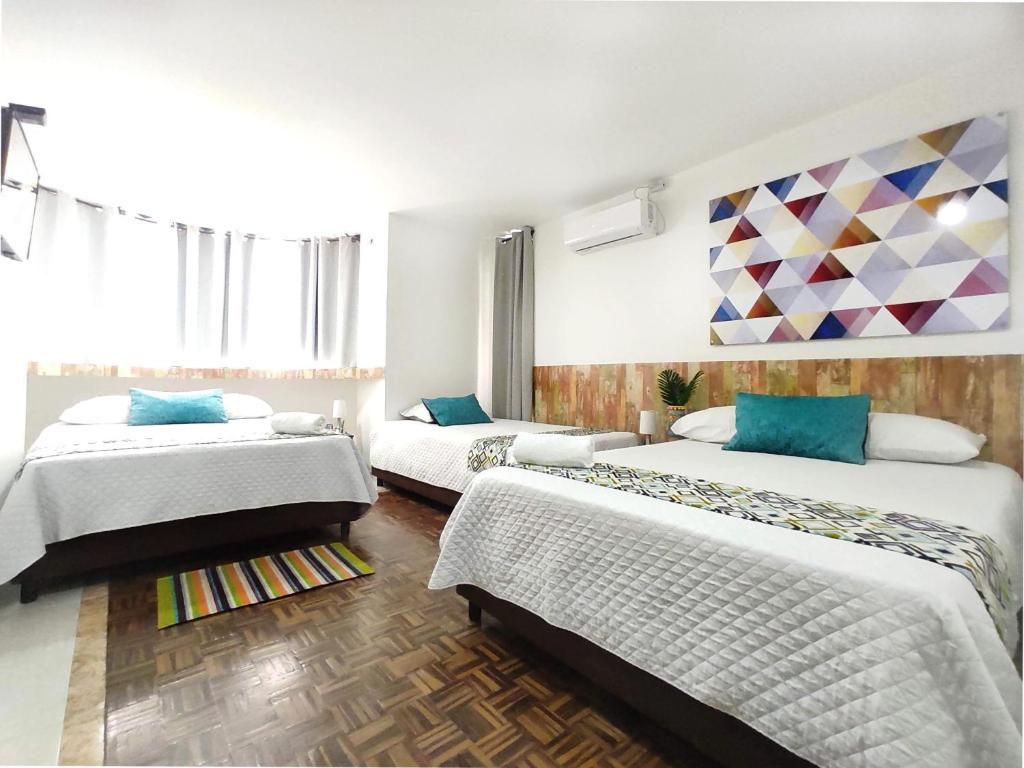 Postel nebo postele na pokoji v ubytování Walena Hotel