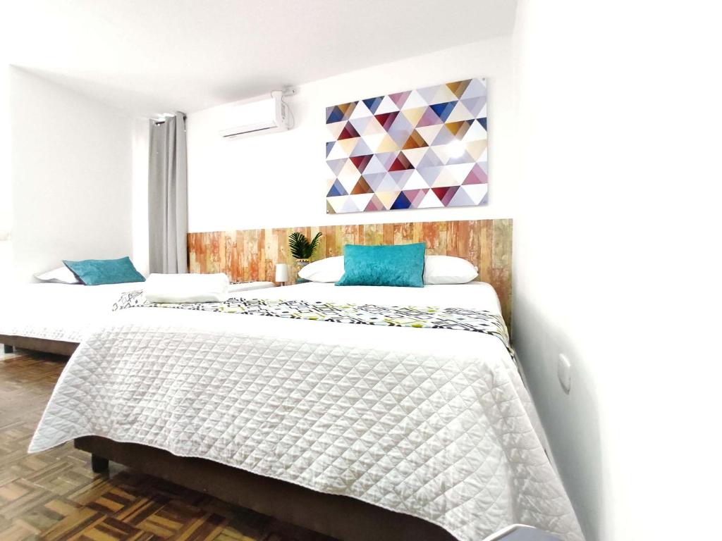 Postel nebo postele na pokoji v ubytování Walena Hotel