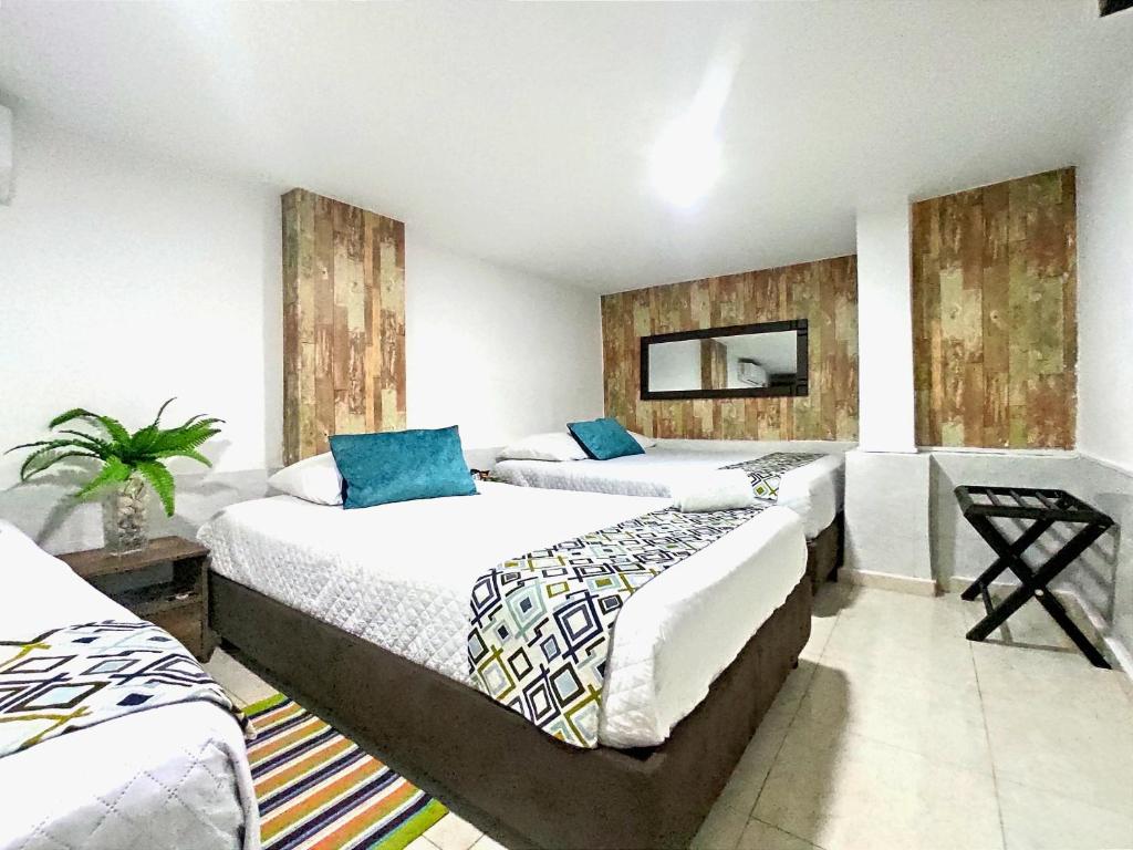 Postel nebo postele na pokoji v ubytování Walena Hotel