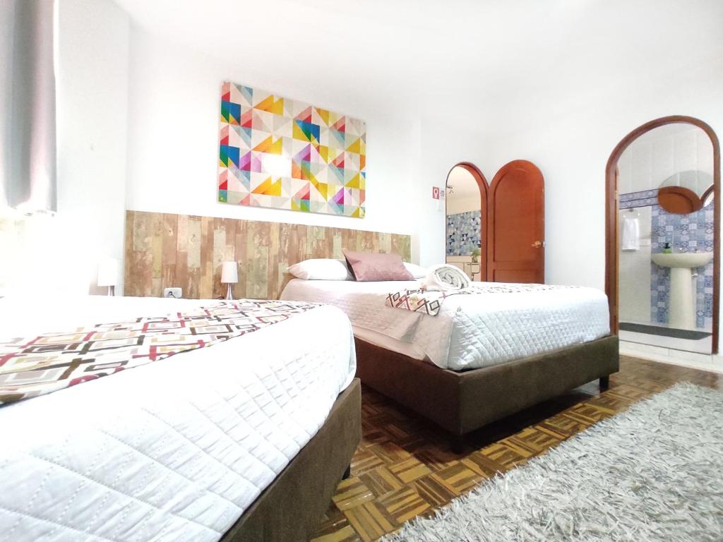 Postel nebo postele na pokoji v ubytování Walena Hotel