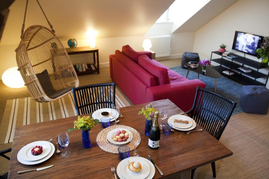 Posezení v ubytování Les Appartements d'Alexandre