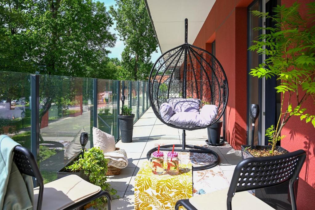 Posedenie v ubytovaní Praktyczny apartament z cichym tarasem