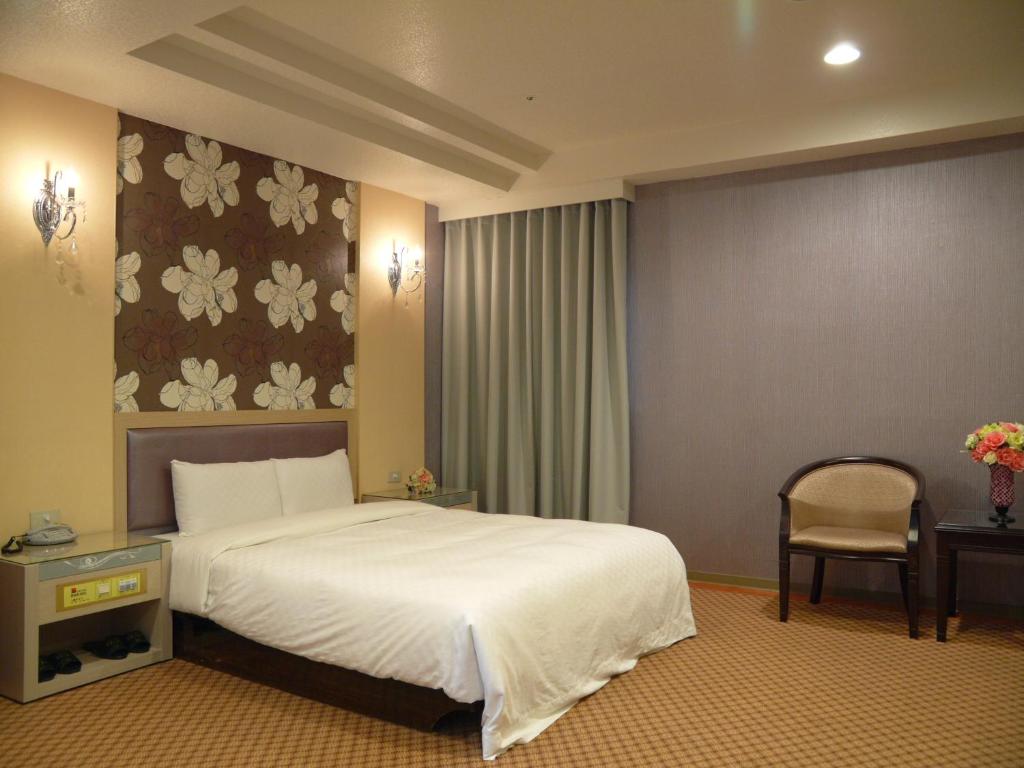 Postel nebo postele na pokoji v ubytování Beidoo Hotel