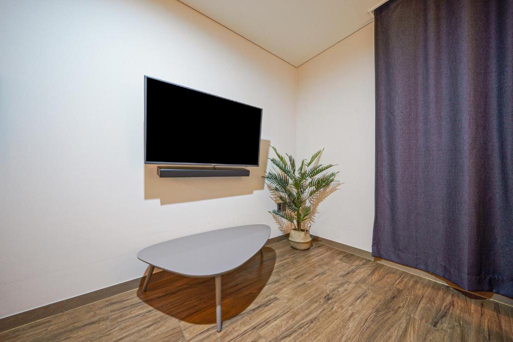 TV a/nebo společenská místnost v ubytování MTM Family Hotel