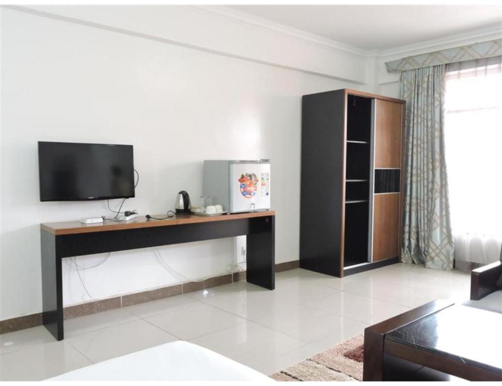 TV a/nebo společenská místnost v ubytování Sky Hotel Nairobi