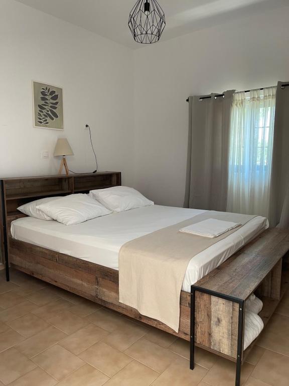 Postel nebo postele na pokoji v ubytování Eco Beach And Magic Garden Hotel