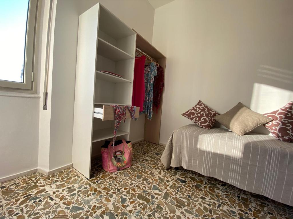 Postel nebo postele na pokoji v ubytování Rossocorallo Rooms