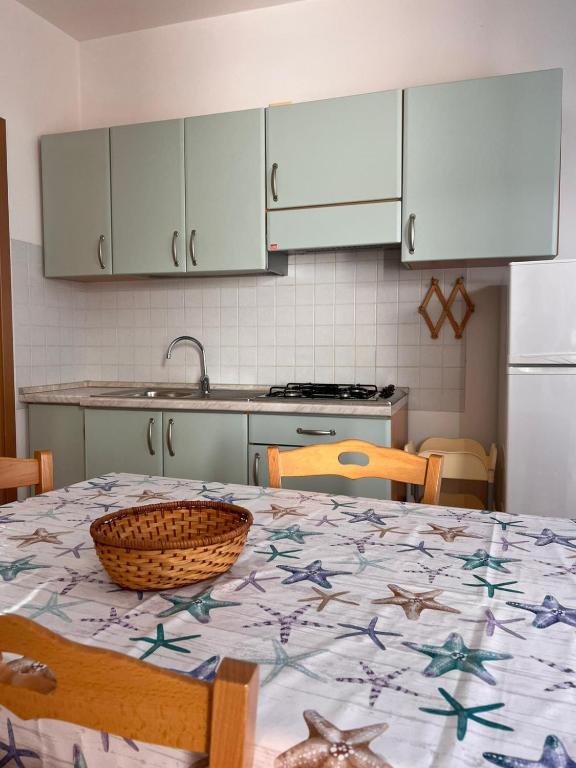 A kitchen or kitchenette at Appartamenti Serena