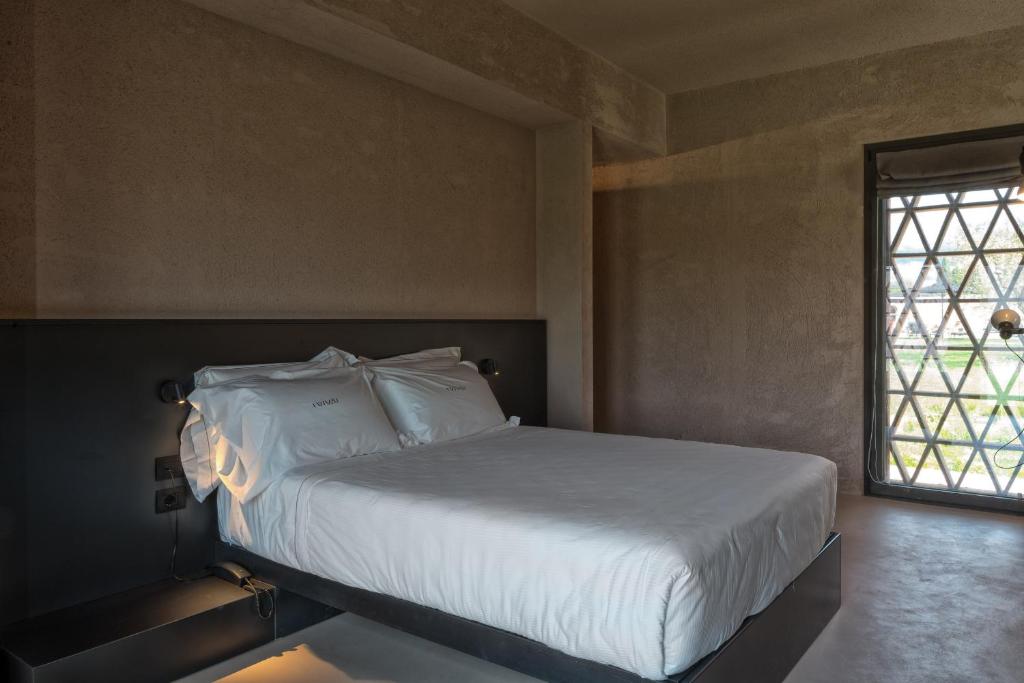 A bed or beds in a room at I Vivai