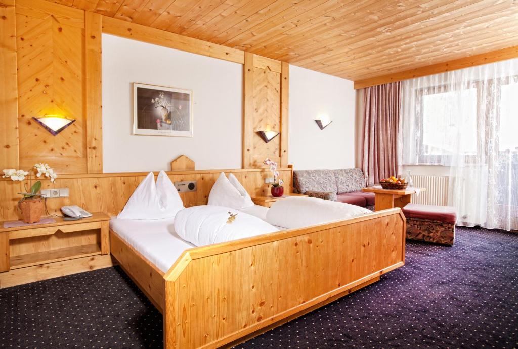 Postel nebo postele na pokoji v ubytování Appartementhaus zum Holzknecht am See
