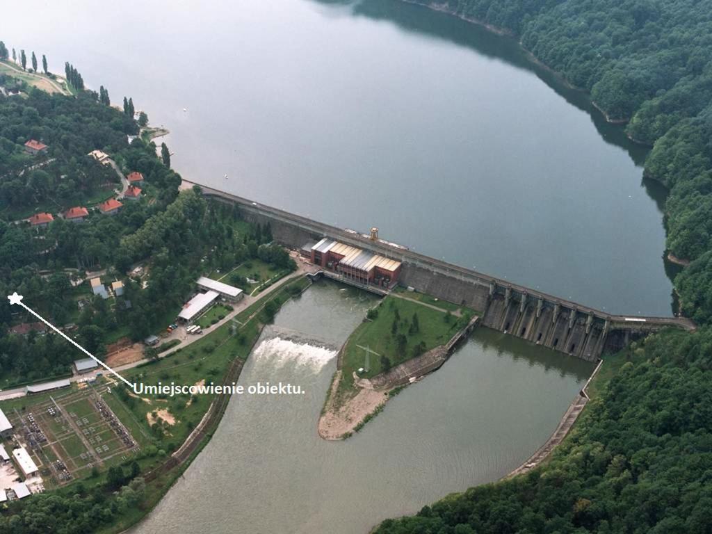 an aerial view of a dam on a river at Viking Rożnów in Rożnów