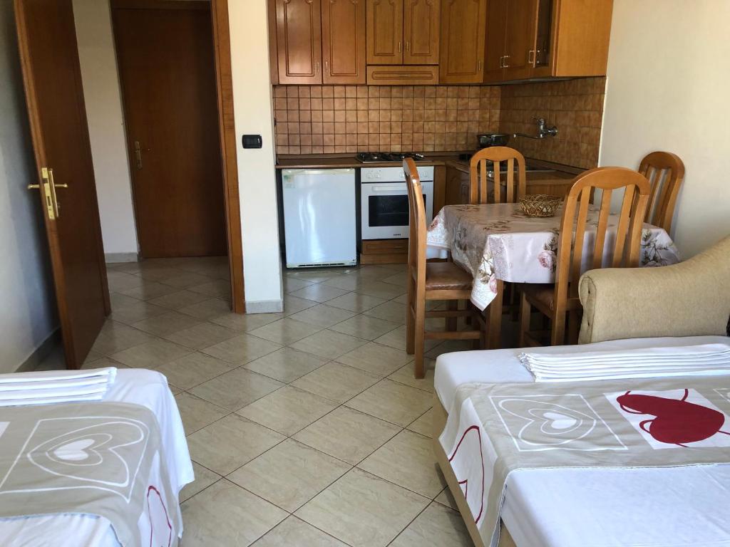 Kuchyň nebo kuchyňský kout v ubytování Relax Apartment & Hotel