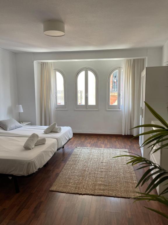 Posteľ alebo postele v izbe v ubytovaní IRUA APARTAMENTOS