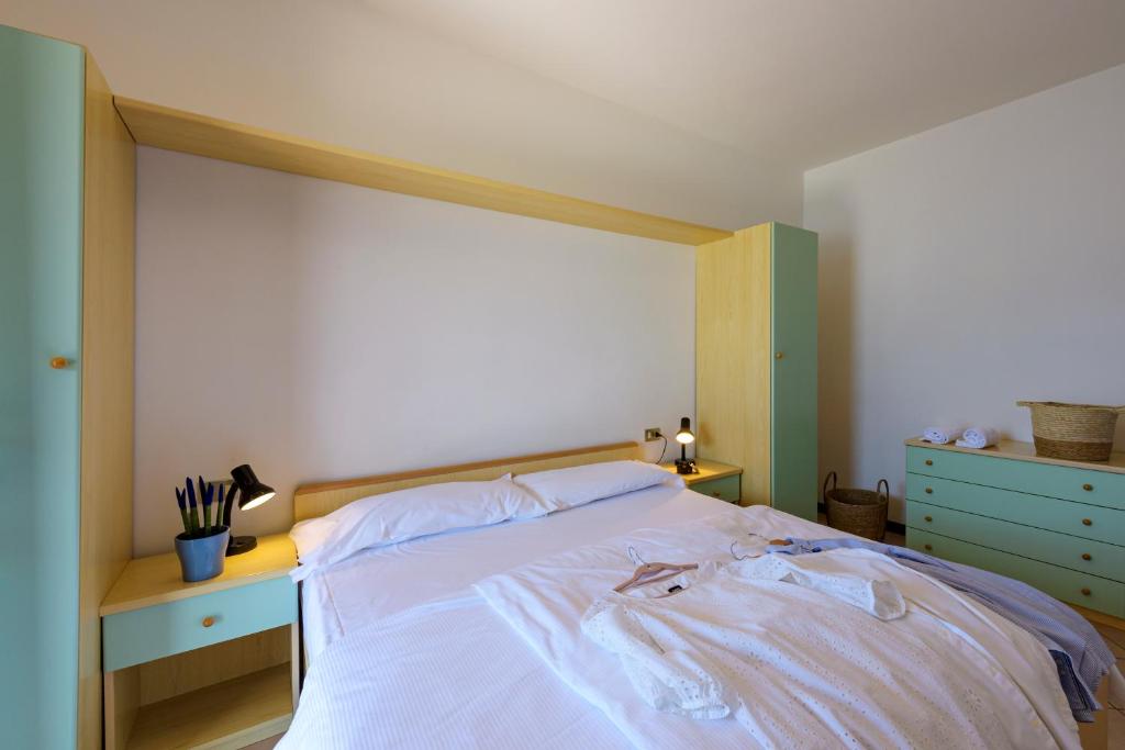 Postel nebo postele na pokoji v ubytování Residence Ruculì - Ruculì Hospitality