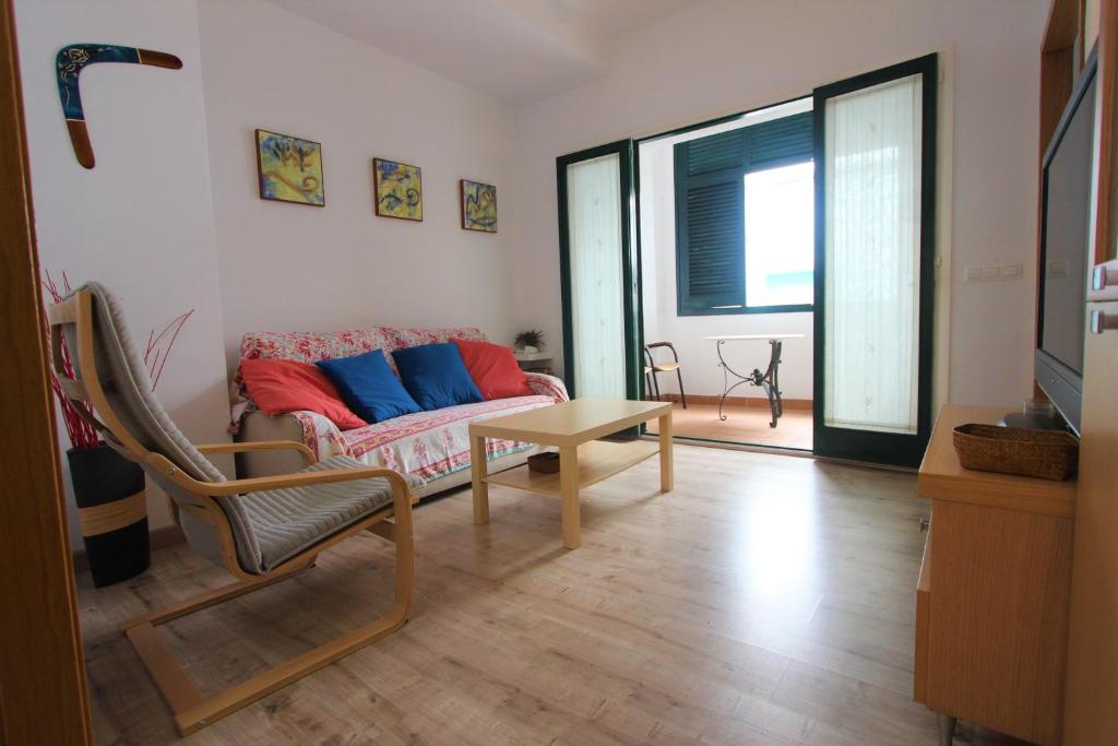 a living room with a couch and a table at Apartment Tossa in Tossa de Mar