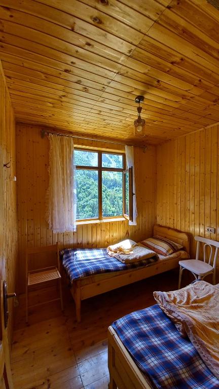 Postel nebo postele na pokoji v ubytování Guest House ELISABETH