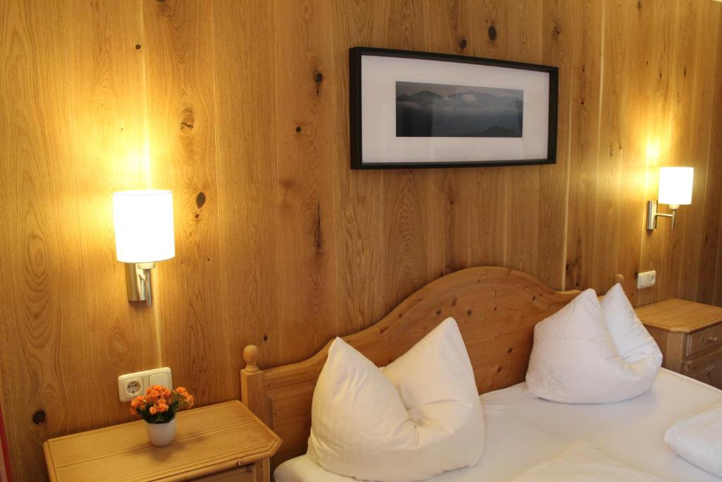 Postel nebo postele na pokoji v ubytování Berghof