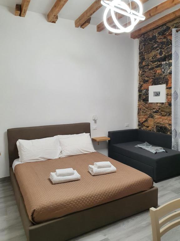 Postel nebo postele na pokoji v ubytování 5 Terre Station Rooms