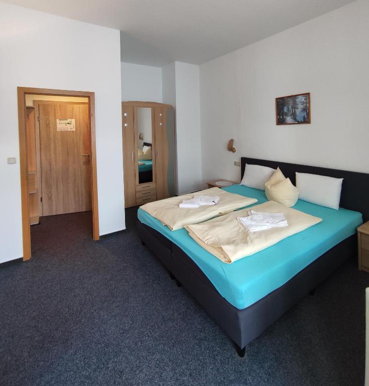 Postel nebo postele na pokoji v ubytování Hotel Waldmühle