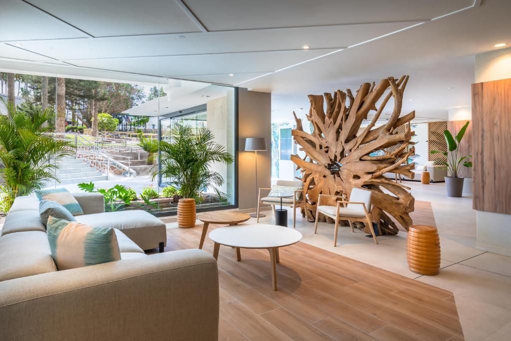 A seating area at Barceló Margaritas Royal Level Adults Only