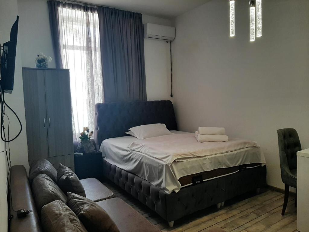 Postel nebo postele na pokoji v ubytování kessane