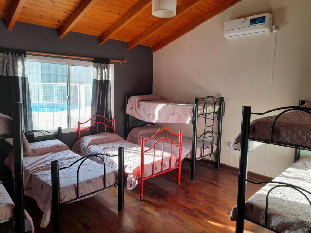 Postel nebo postele na pokoji v ubytování Casa Villa del Lago