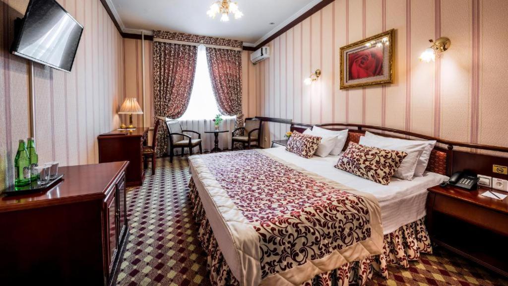 Postel nebo postele na pokoji v ubytování Asia Tashkent Hotel