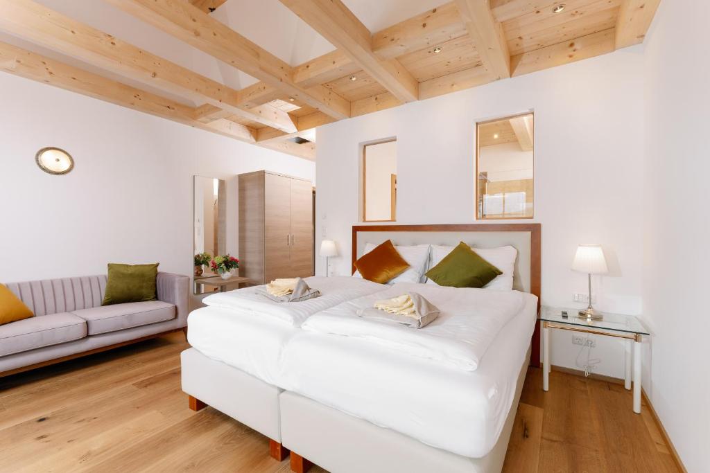 Postel nebo postele na pokoji v ubytování Villa Frischmuth am See