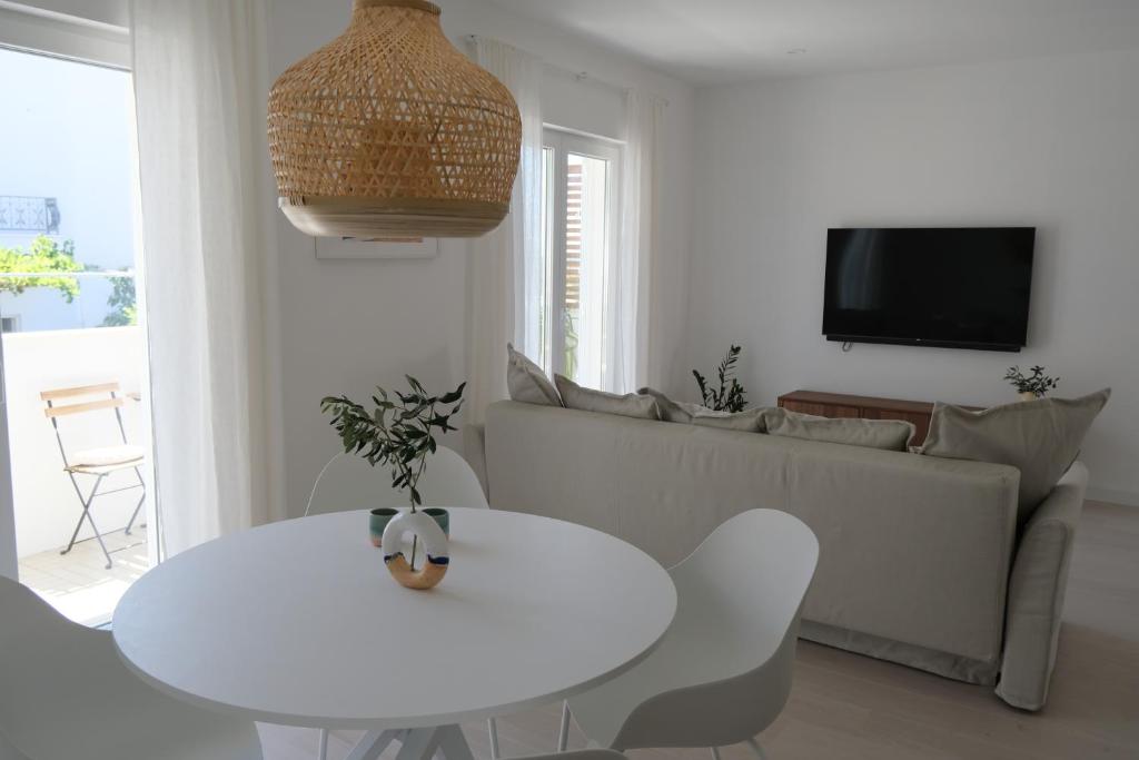 Televízia a/alebo spoločenská miestnosť v ubytovaní FeelAtHome Hvar Apartments
