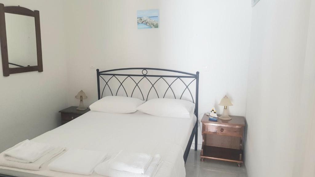 Posteľ alebo postele v izbe v ubytovaní Potter's Apartment/40 meters from the beach