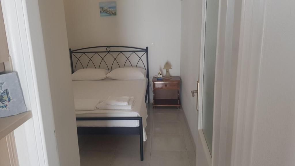 Posteľ alebo postele v izbe v ubytovaní Potter's Apartment/40 meters from the beach