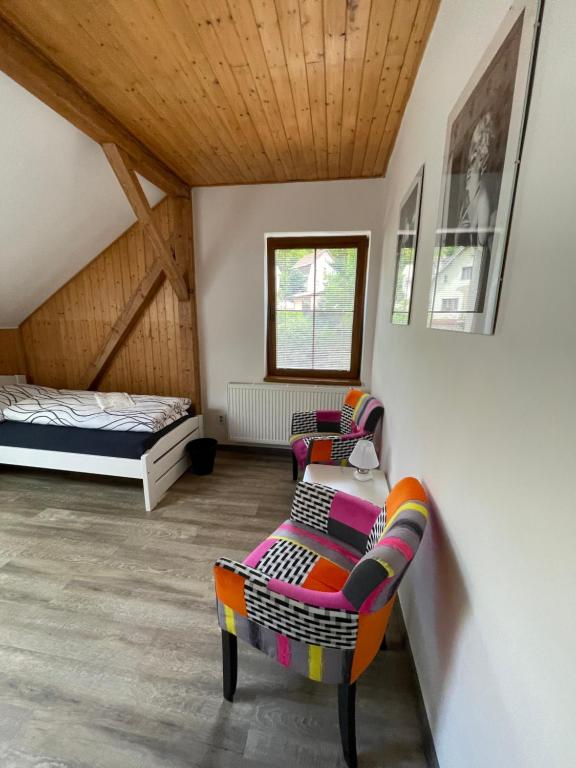Postel nebo postele na pokoji v ubytování Wellness pobyt v Pekle