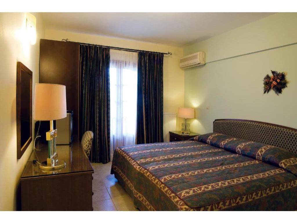 Postel nebo postele na pokoji v ubytování Corfu Club Standard Apartment 1