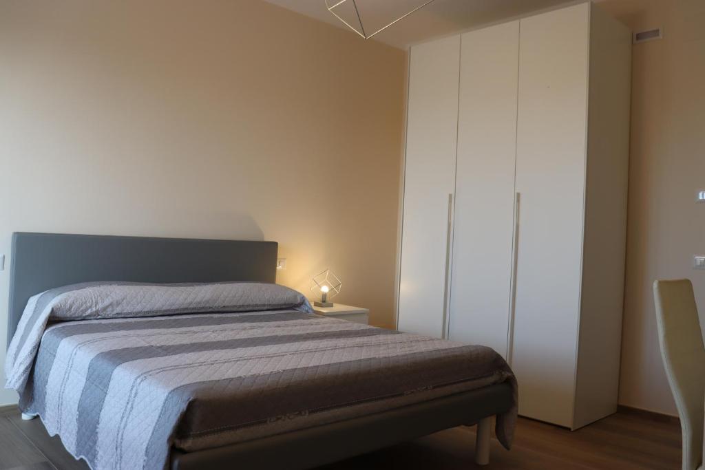 Łóżko lub łóżka w pokoju w obiekcie La Casa de Anto'