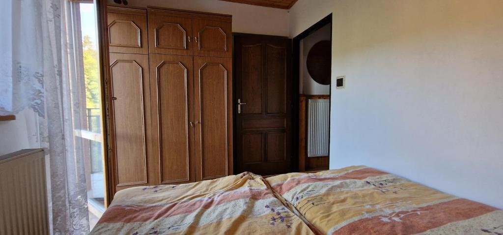 Posteľ alebo postele v izbe v ubytovaní Horská chata Zubor